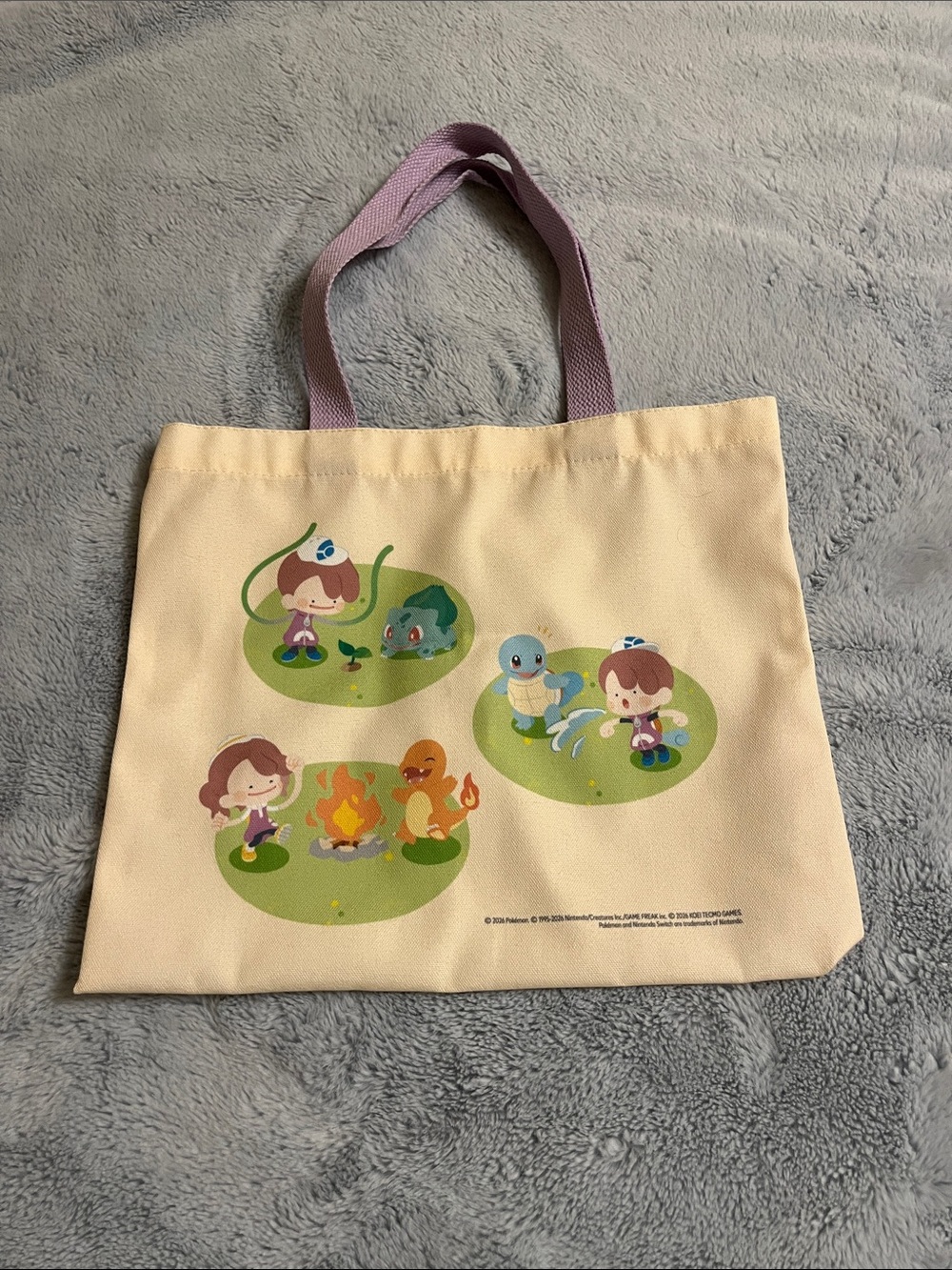 Pokemon Cream Tote with Lilac Handles and Colorful Pokopia Characters - Picture 2 of 4